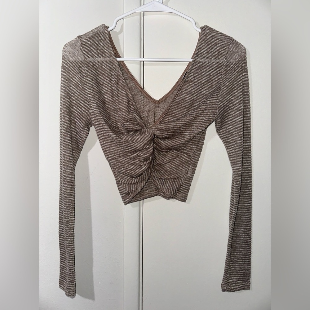 Brown long sleeve crop top, never worn. Got it from a boutique.